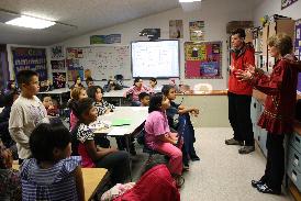 Sen. Murkowski and Principal Wohlman talk with 4th- 6th grade students at Zakar Levi Elementary